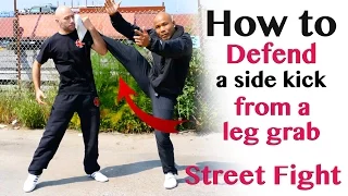 Defend a side kick from a leg grab in fight | Street Fight