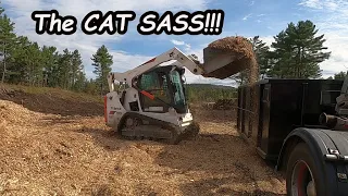 Bobcat T-590-Cleaning up Mulch.