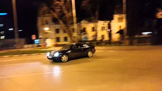 Mercedes CLK drifting around a roundabout