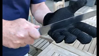 Cut proof test of the Anti Cut Steel Glove from Bladerunner.tv