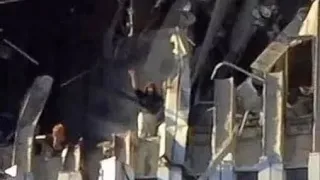 Good quality video of edna cintron waving on the north tower of wtc