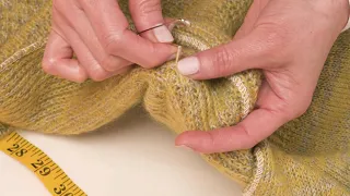 Comment rentrer une maille tirée dans un pull ?