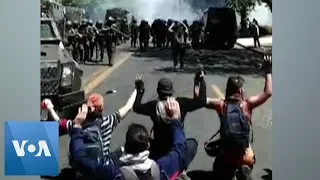 Chilean Police Shoot at Protesters With Hands Up