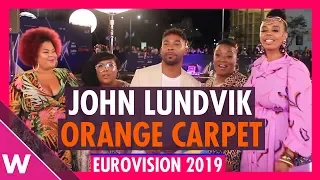 Sweden's John Lundvik and his Mammas sing on Eurovision 2019 Orange Carpet