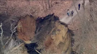 Water built up by clogged pipes led to road collapse in Mullica Hill