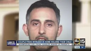 Man found holding baby in Tempe house