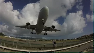 Insanely Low Takeoff from St. Maarten (SXM) in Opposite Direction over Maho Beach