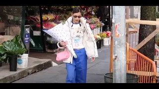 Bella Hadid picks up some pink flowers in Tribeca