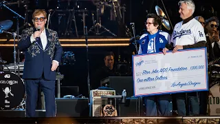 Dodgers owners Mark Walter & Billie Jean King present donation to Elton John AIDS Foundation