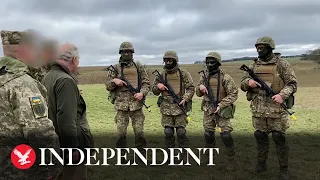 King Charles watches Ukrainian troops in action at training site