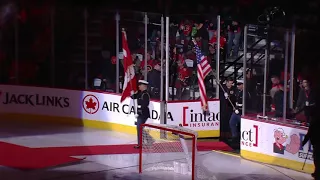 Nash in the background during the anthem - George Canyon