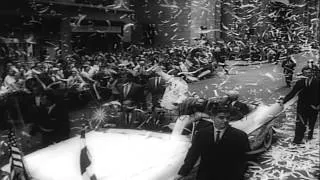 A ticker tape parade to welcome King Bhumibol Adulyadej and Queen Sirikit of Thai...HD Stock Footage