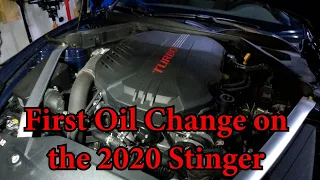 It's the first time changing the oil on the 2020 Kia Stinger indigo blue and GMC Sierra.