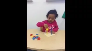 Toddlers learn to self-correct at Apple Montessori Schools