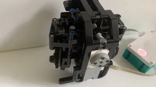 Lego- Testing new system for  two leg robot walking  and turning with two motors.