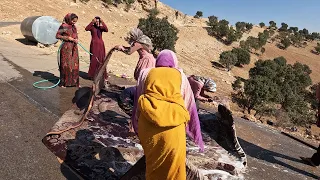 Washing the Carpets Before Moving to the Main Village_the nomadic lifestyle of Iran