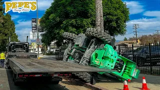 Telehandler falls off trailer