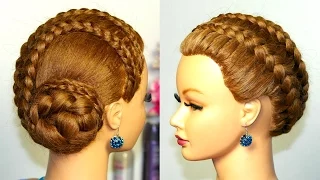 Braided updo hairstyle for long hair.  French braids.