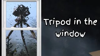 Tripod in the window