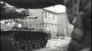 Tanks and troops of the 6th Armored Division enter Oberdorla, Germany during Worl...HD Stock Footage