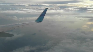 Garuda indonesia di atas laut perjalanan dari bengkulu ke jakarta