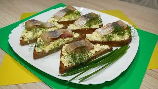 Snack sandwiches with herring for the holiday