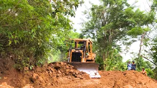 Perfect skill by the D6R XL Bulldozer Pushing Mountainous Land and Against Rocky Land
