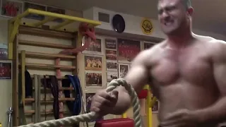 Training of Armwrestling Pushkar shirtless in Zloty Tur club