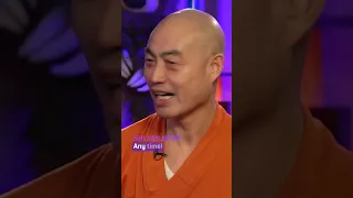 Buddhist monk breaks rocks with his head