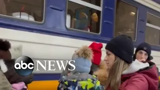 Packed trains depart Ukraine as families flee Russian attacks