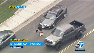 RAW VIDEO: Passenger exits chase suspect's car, taken into custody | ABC7