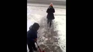 Dymin and Malachi shoveling snow 2012