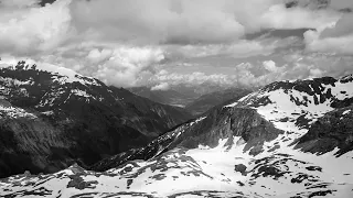 Timelapse: view of Zell am See from Edelweßspitze in black and white.