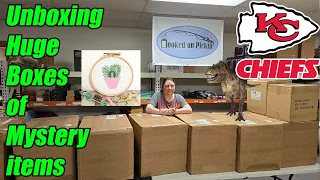 Unboxing Liquidation and closeouts form a Local Company. Dinosaurs, Kansas City Chiefs memorabilia