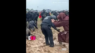 German police stuck in mud taunted by 'wizard' at coal mine protest