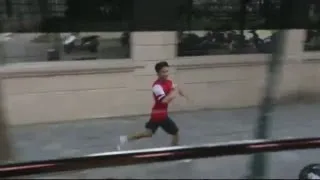 Determined Arsenal fan runs alongside tour coach in Vietnam for FIVE MILES