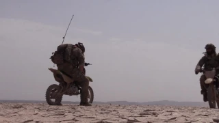US Special Forces prepare a dirt landing strip on Dirt bike for the biggest plane