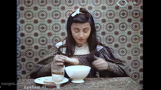 The girl shares breakfast with the cat.Fragment of forgotten silent film 1906.Bits & Pieces ✅ 4к 60