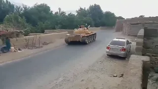 Taliban on T-55 tank