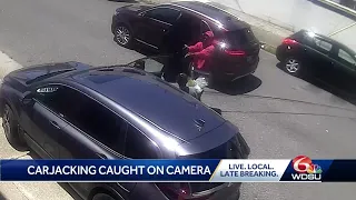 Surveillance camera captures terrifying carjacking