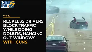 Reckless drivers block traffic while doing donuts, hanging out windows with guns