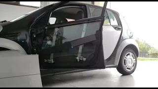 Desmontar panel puerta de Smart forfour