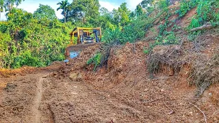 The Action of the D6R XL Bulldozer Operator When Cutting a Hill to Open a New Road