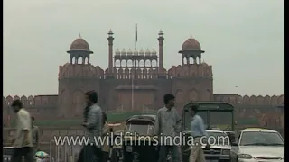 Old school autos and buses: Traffic outside Red Fort in 1990s