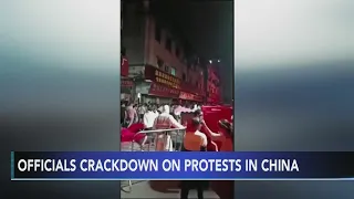 China sends students home, police patrol to curb protests