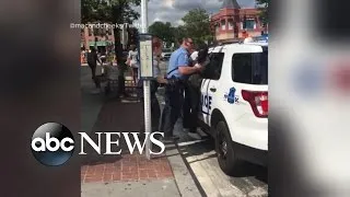 Officer Appears to Lift Woman Off the Ground During Confrontation