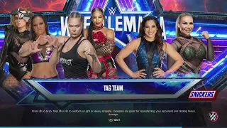 Ronda Rousey and Shayna Baszler vs Natalya and Raquel Rodriguez