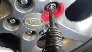 how to remove a lock nut without the key