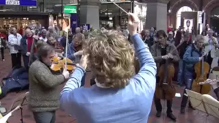 Flash mob at Copenhagen Central Station. Copenhagen Phil playing Ravel's Bolero.