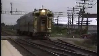 Rondout 1987 Amtrak Bi-Level Blasts By - Metra F40C 604 Pushes Commuter